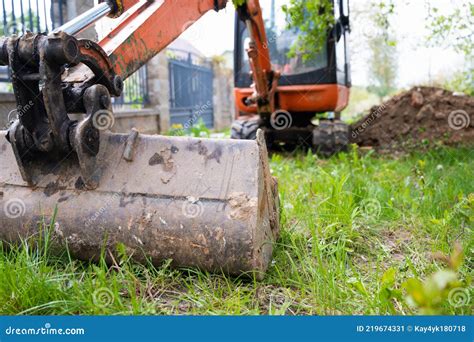 Orange Mini Excavator Rental 